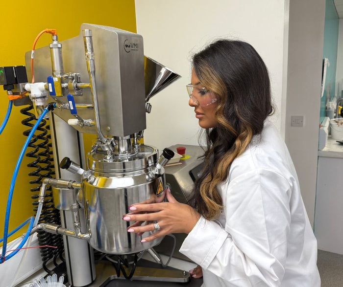 Two woman holding the Pure Glow Range by Fade Out